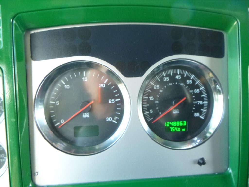 Green Kenworth W900 with 1248863 Miles
